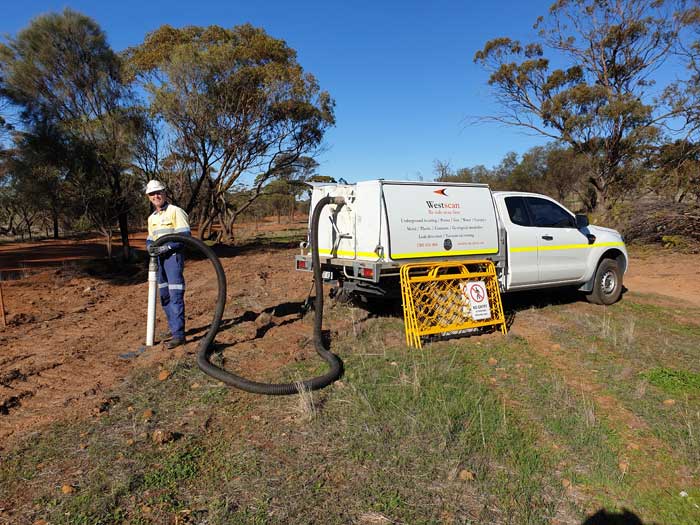 Vaccum excavating water pipe